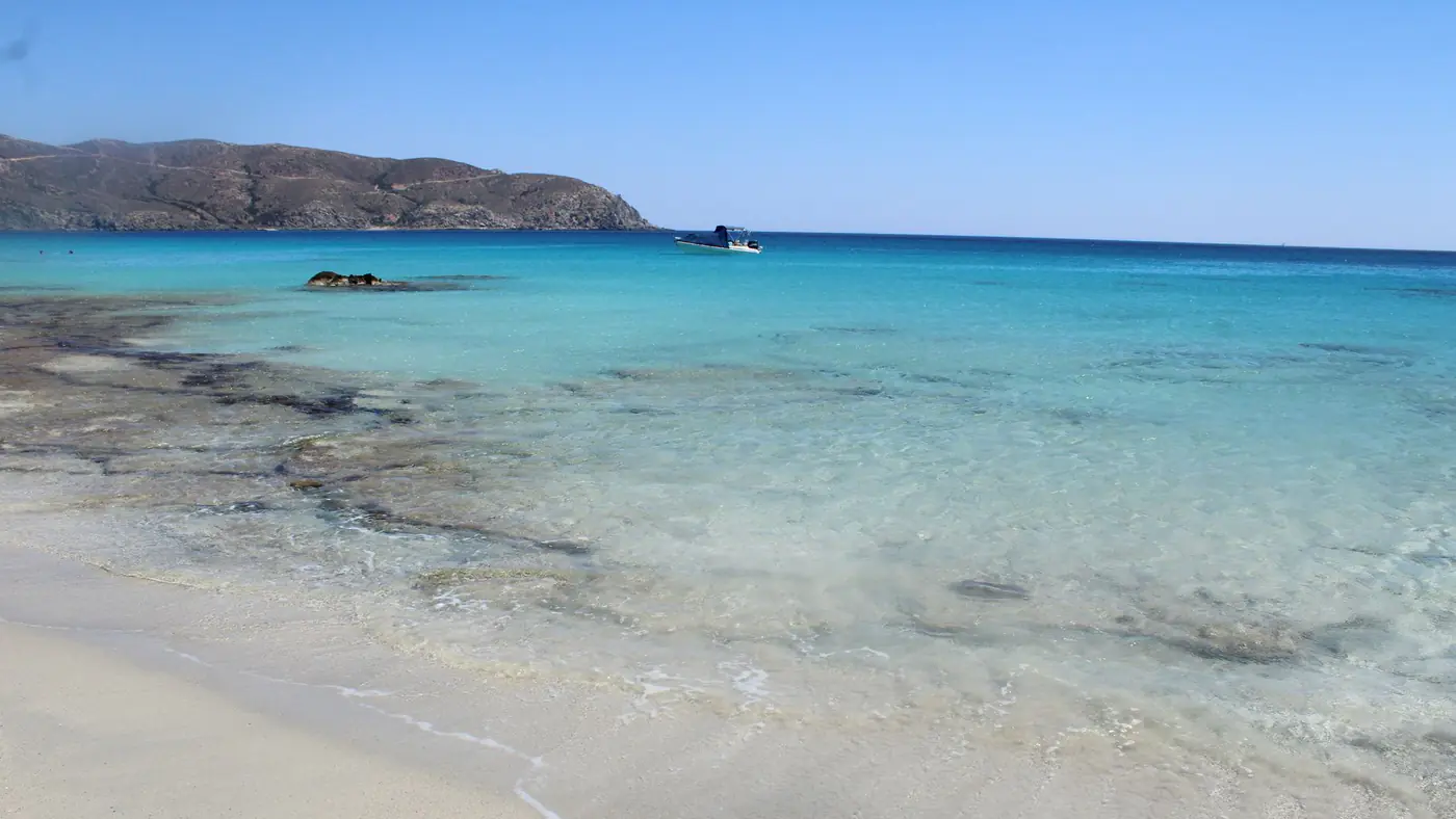 Discover the serene beauty of Crete's turquoise waters and sandy beaches in Greece.