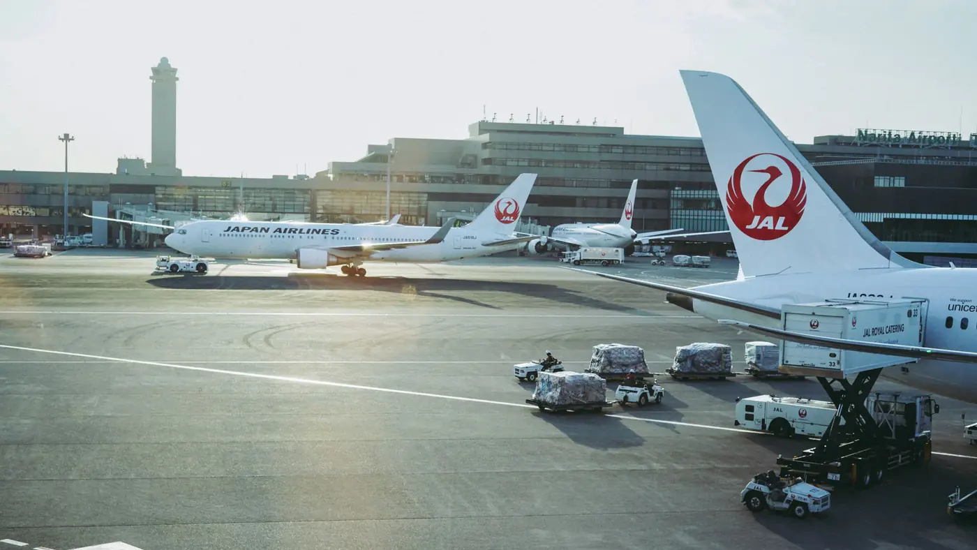 Japan Airlines planes on the tarmac at Narita International Airport in Chiba, Japan.