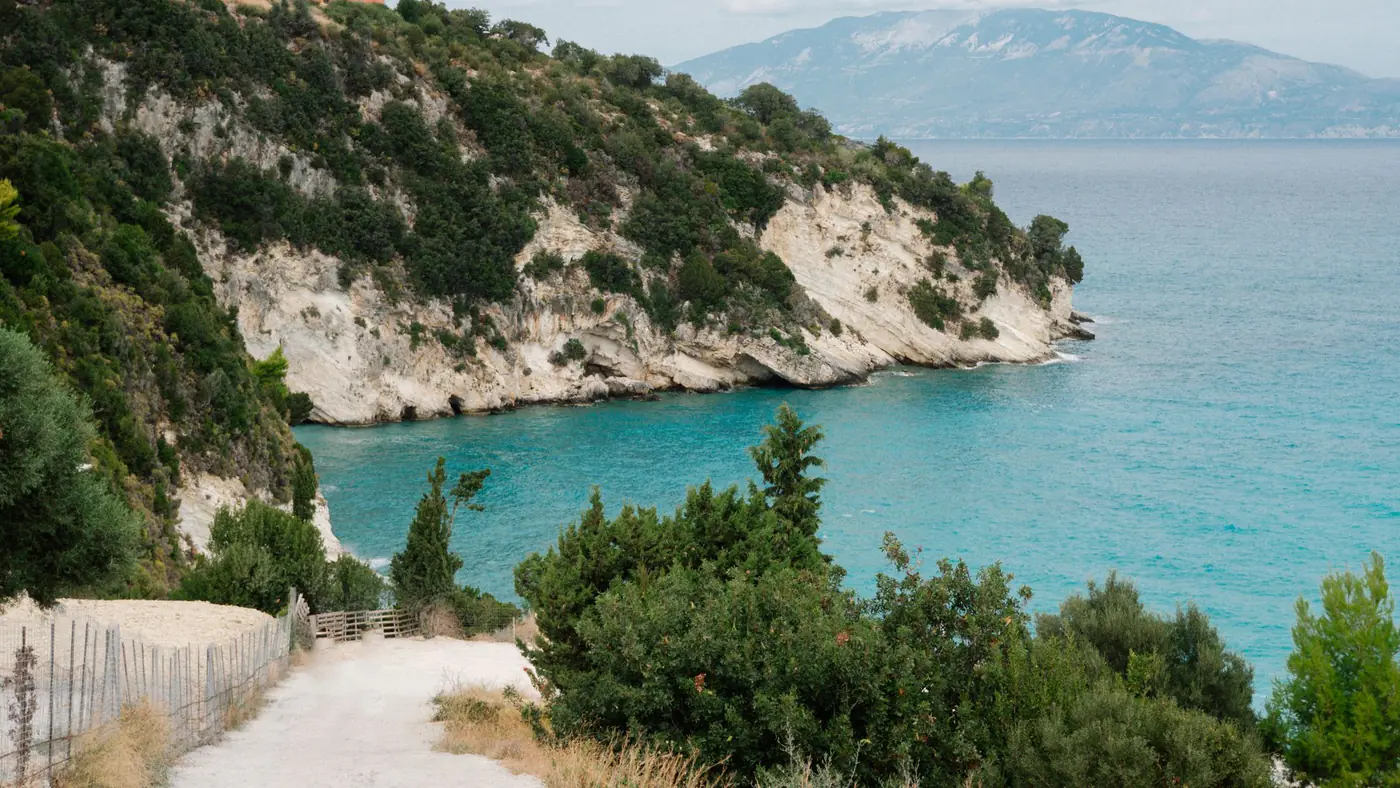 Breathtaking coastal landscape of Zakynthos, Greece with turquoise waters and lush greenery.