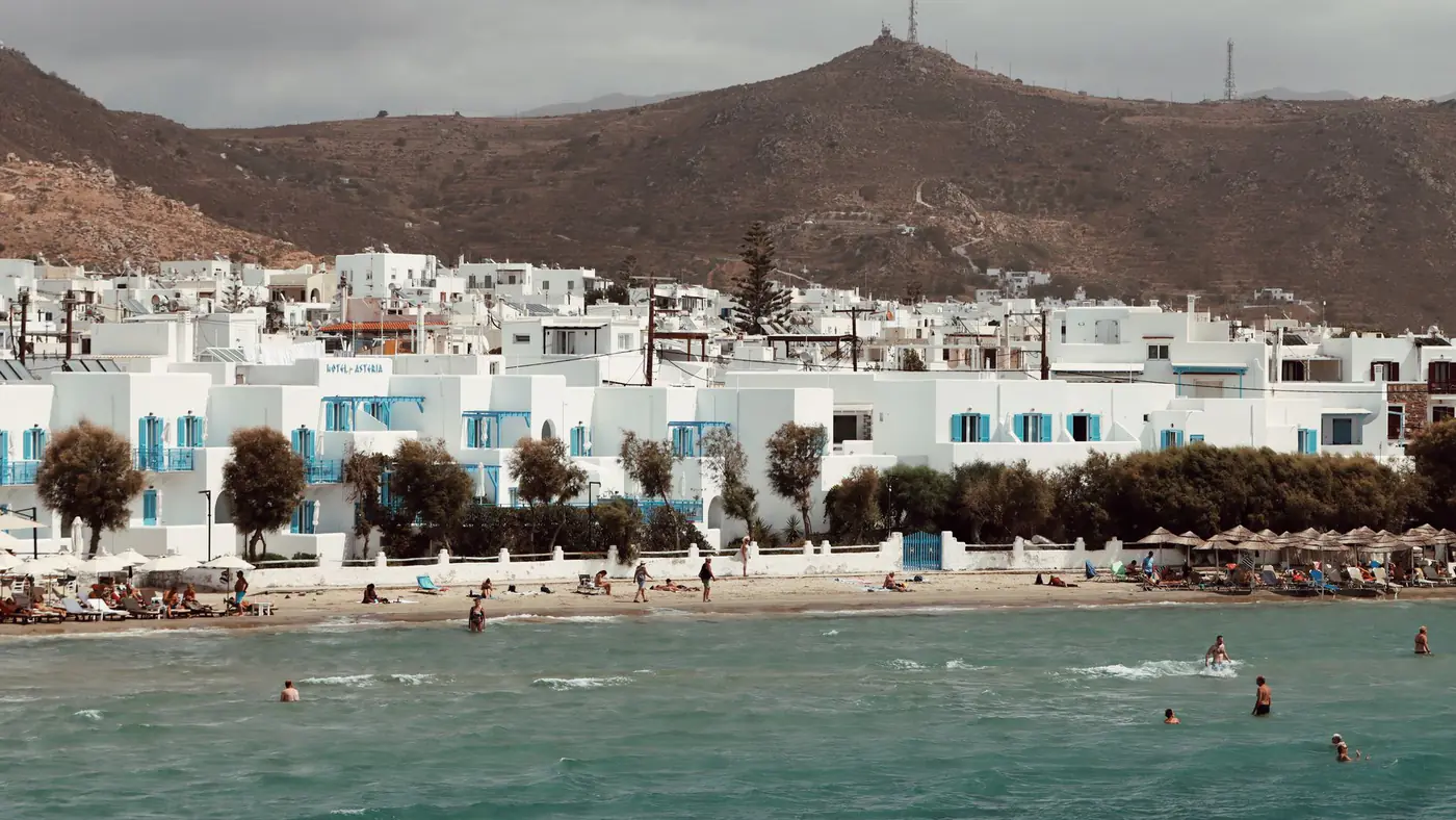 Coastal scene with traditional architecture on Naxos, Greece, by the Aegean Sea.